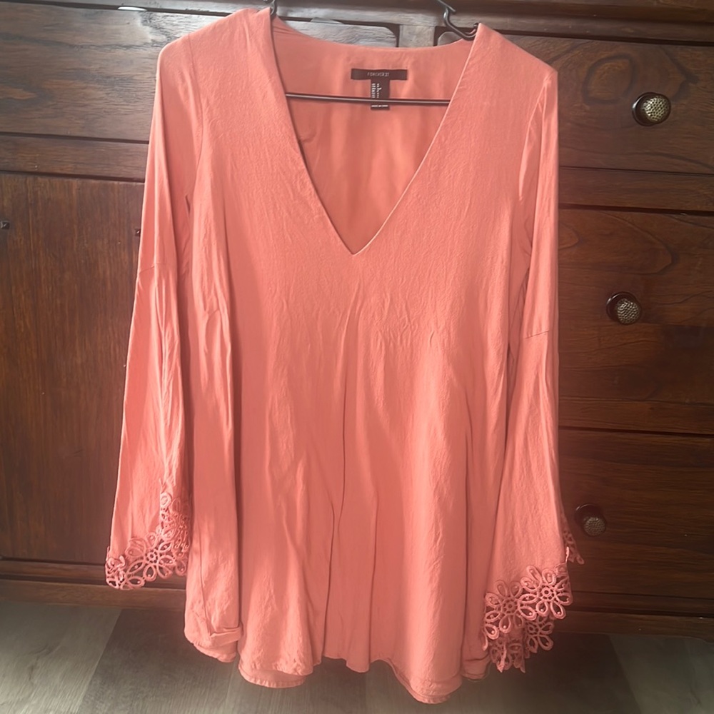 Size Small Forever 21 Peach colored top with ruffled bell sleeves